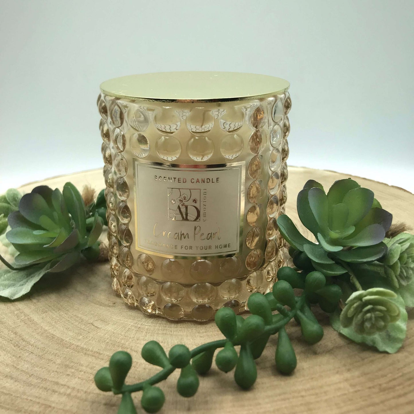 Dolci pensieri gift CANDELA PROFUMATA IN VETRO BEIGE SMERIGLIATO CON COPERCHIO ORO IN METALLO