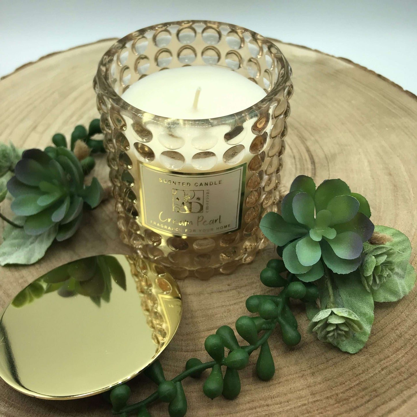 Dolci pensieri gift CANDELA PROFUMATA IN VETRO BEIGE SMERIGLIATO CON COPERCHIO ORO IN METALLO