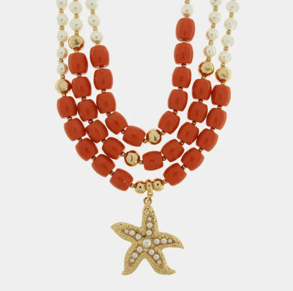 Collana in Metallo stella marina con sfere rosse e bianche
