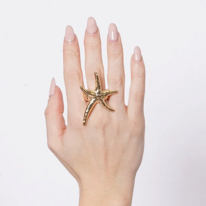 Anello in Metallo a forma di stella marina con rifinitura martellata
