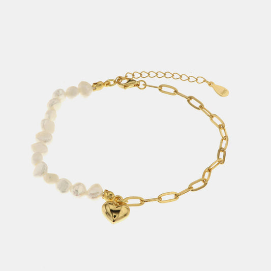 Bracciale in Argento 925 con catena che si intreccia con cuore pendente a perle barocche
