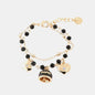 Dolci pensieri gift AMO CAPRI Bracciale in Metallo con cuore, cristalli bianchi e campanella portafortuna