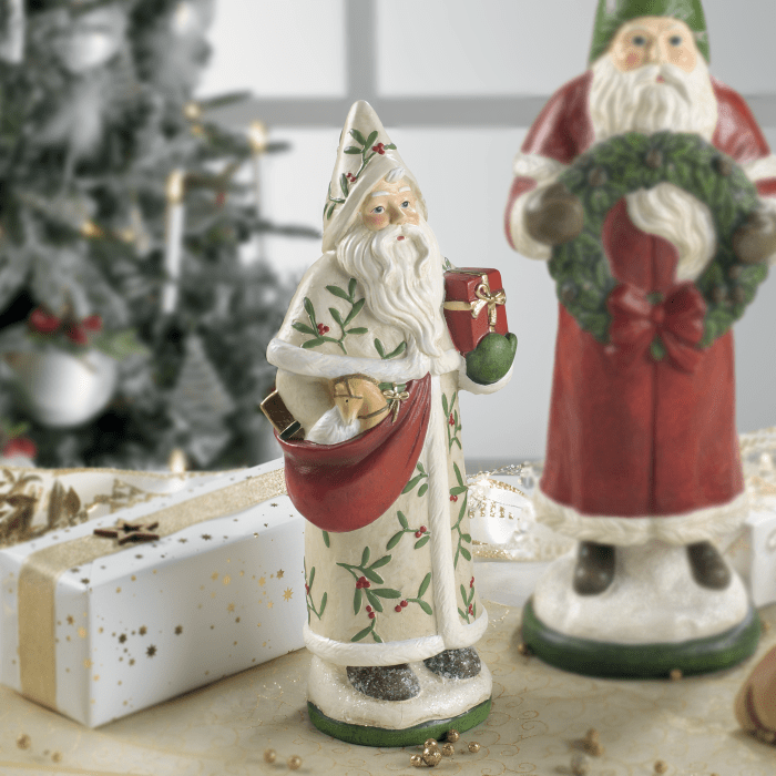 Dolci pensieri gift SANTA CLAUS IN RESINA CON DONI  Dimensione: 12,5x8,5x30,5 h. cm.