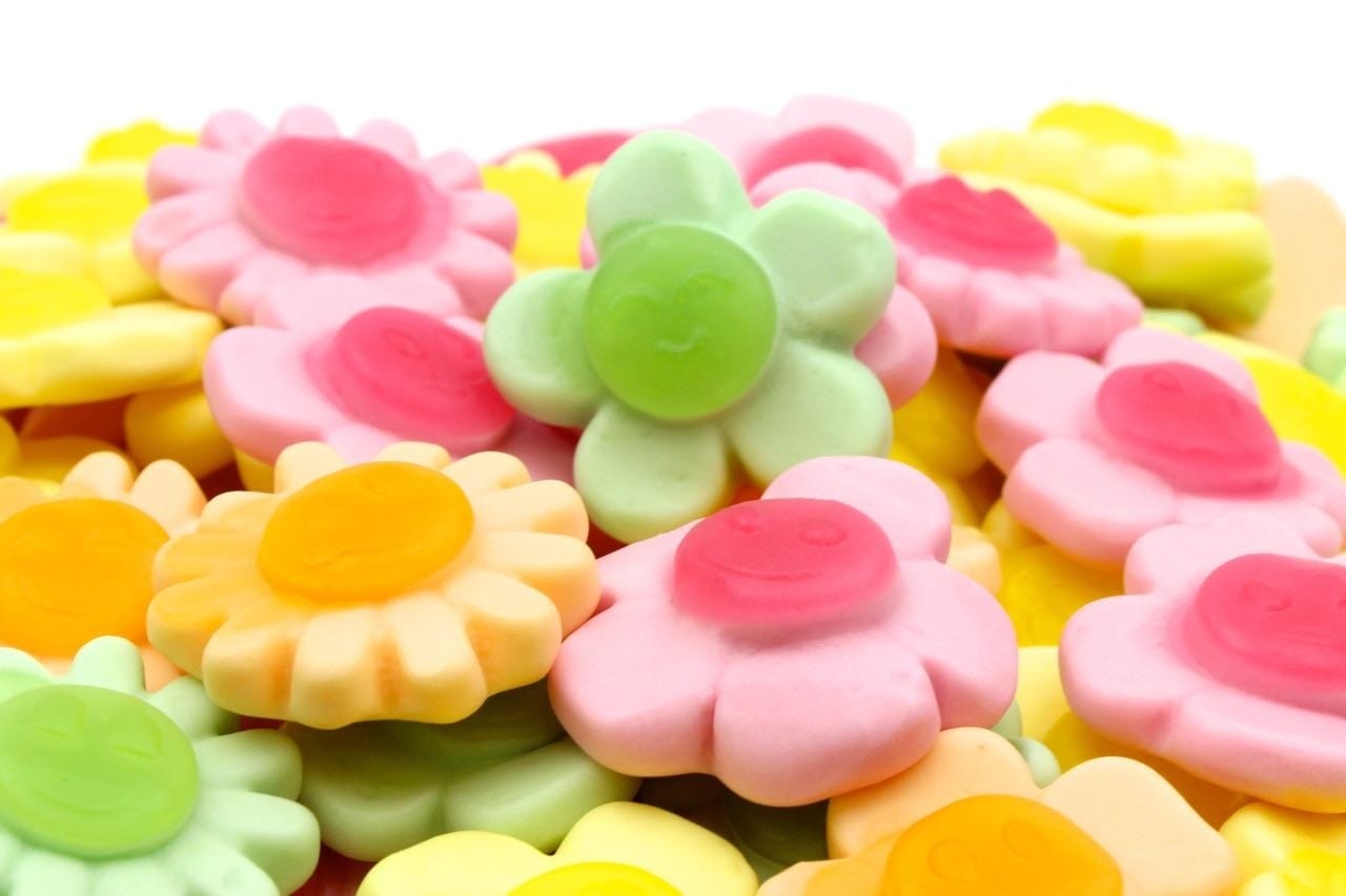CARAMELLE GOMMOSE FIORI COLORATI ALLA FRUTTA ASSORTITI CONFEZIONE DA 100GR - Dolci pensieri gift